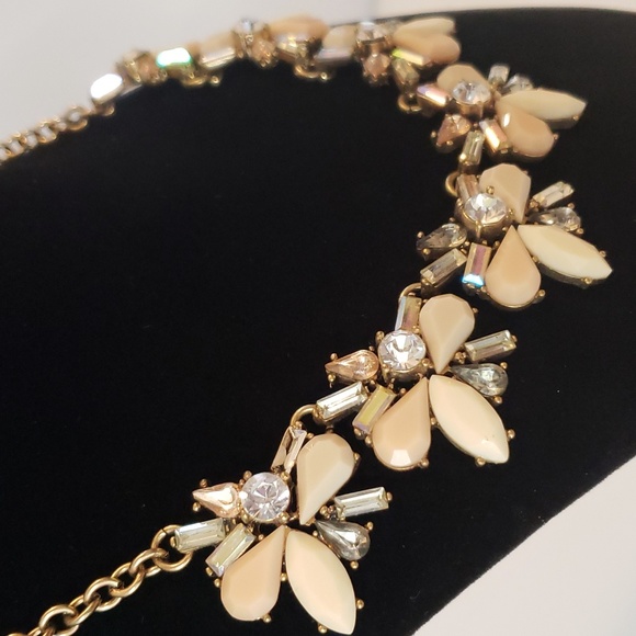 Antique Goldtone Bib Necklace with Clear, Cream, and Peach Rhinestones - Picture 1 of 7